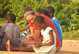 Volunteer Care A volunteer interacts with a child on a Care and Community Project placement in Ghana