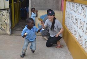 Volunteer Care A Social Work volunteer plays with children at her placement in Ghana