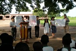 Volunteer Law & Human Rights Laywer Project volunteers present to an audience at a placement in Ghana