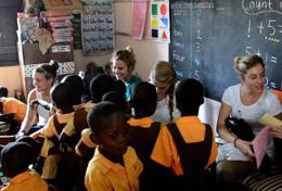Volunteer Care Volunteers interact with children on a Care and Community Project placement in Ghana