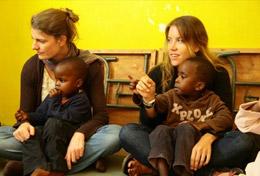 Volunteer Care Care volunteers sit with children at their placement in Kenya