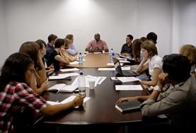 Volunteer Law & Human Rights A group of human rights officers and volunteers have a meeting