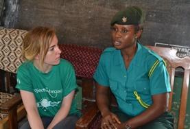 Volunteer Law & Human Rights A volunteer listen intently to an official on a Human Rights Project placement in Ghana